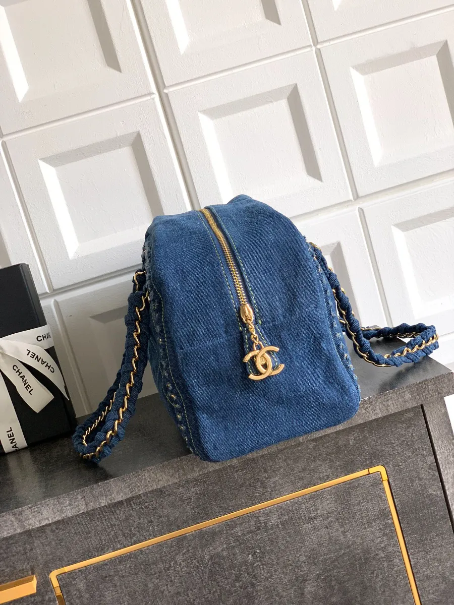 chanel_denim_bostonbag_2240000601656_side.jpg